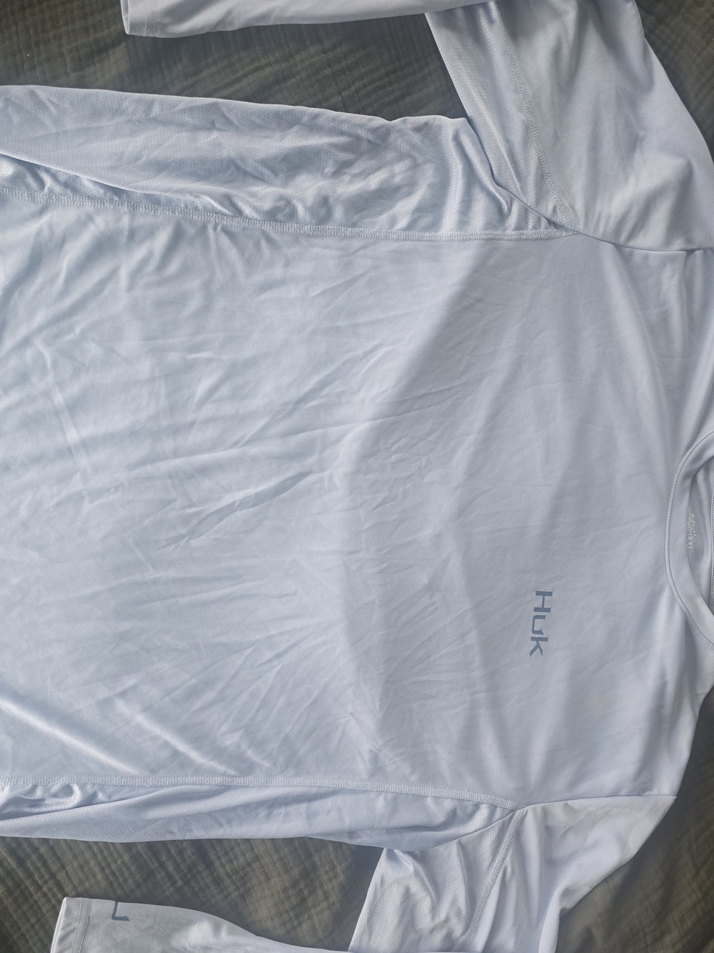 Huk Long Sleeve Performance Shirt in White with Blue Logo